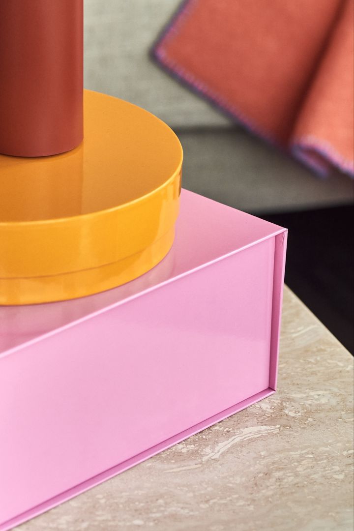 Storage boxes from HAY in orange and pink - one of the on trend colour combinations for Scandinavian interior design trends for 2023.