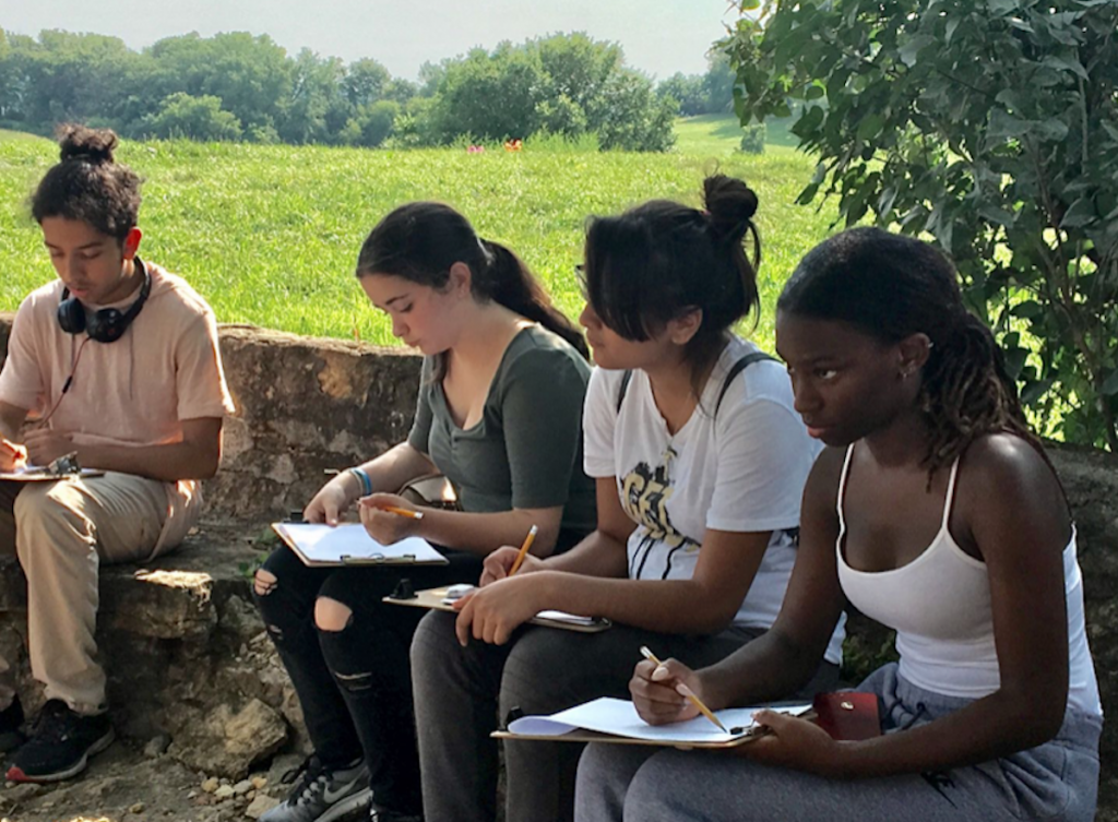 Students Drawing. Promoting 2022 Summer Camps.